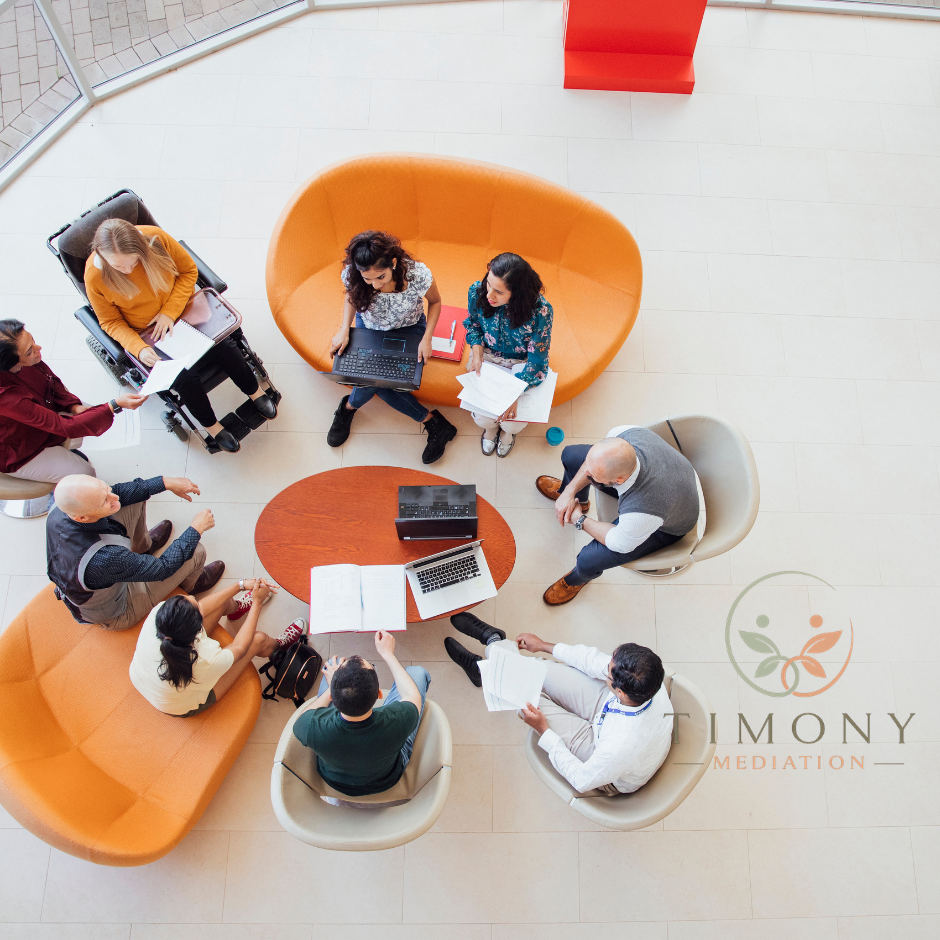 Mediator facilitating a workplace mediation meeting